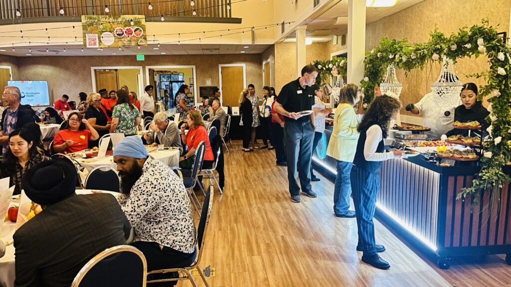 Guests moving through the buffet line
