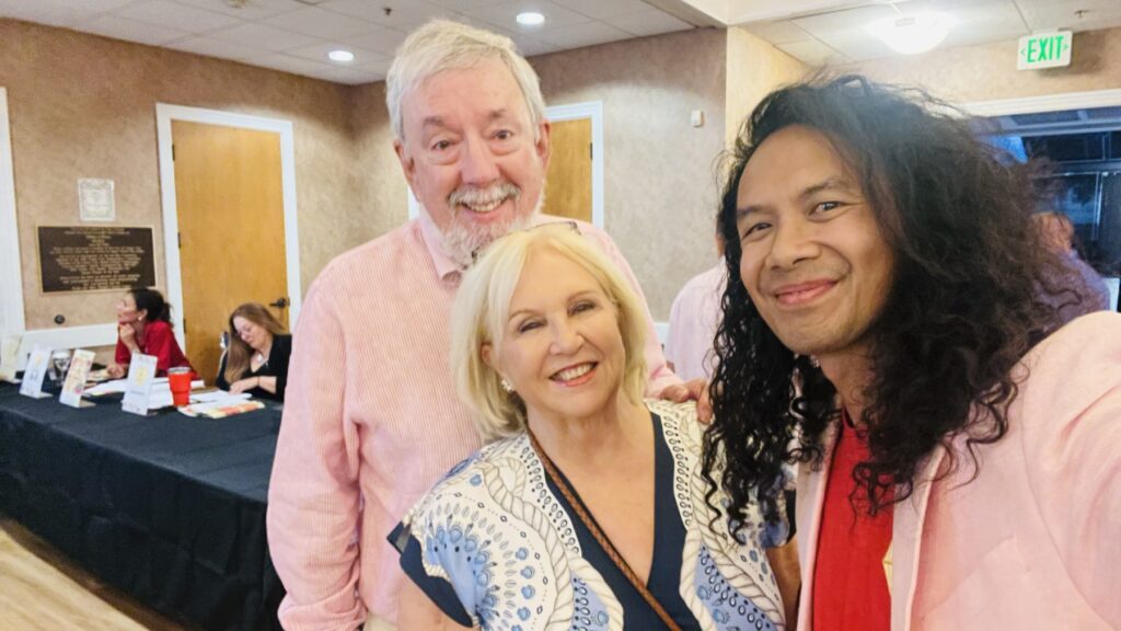Three guests together during the reception