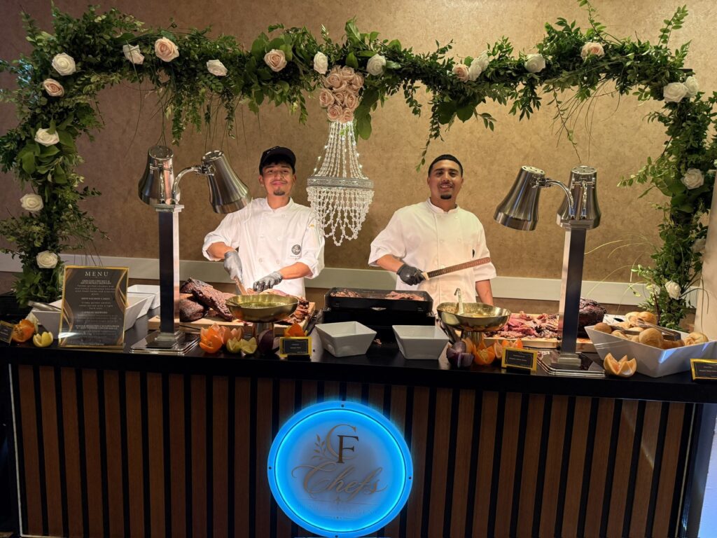 Chefs plating at the station