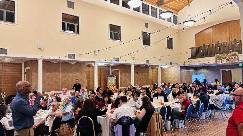 The hall with guests seated for dinner